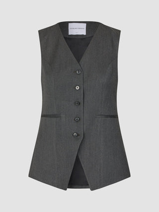 En lång Skye-väst för damer i färgkombinationen ”charcoal melange” med en stilren design med knappar.