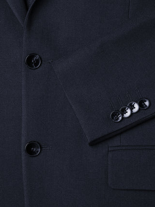 Motion Blazer Regular Midnight Blue: en mörkblå skräddarsydd kavaj med knappar framtill och vid ärmsluten samt 360°-stretch.