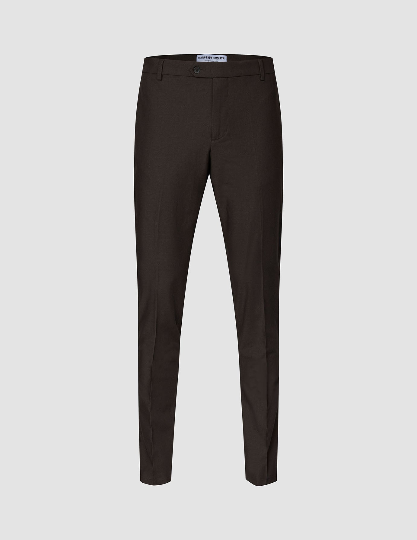 Motion Suit-byxor Slim Cognac i mörkbrunt med smal passform, mittveck och 360°-stretch.
