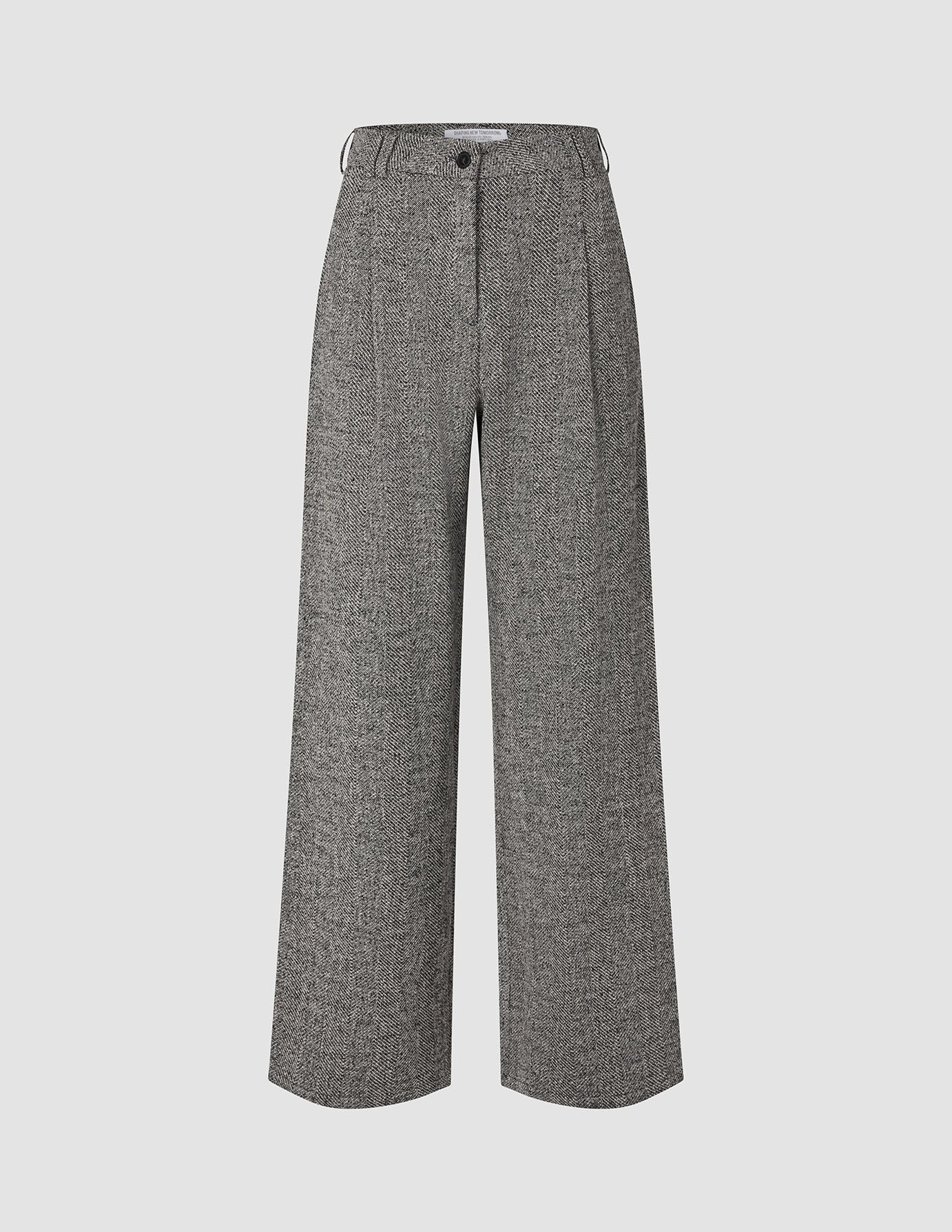Dambyxor Ashryn Wide Domino Herringbone: byxor med hög midja och vida ben i ett svartvitt fiskbensmönster.