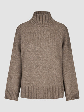 Damtröja i tjock, mjuk ull med hög hals, i färgen taupe melange, med ribbad krage och nederkant.