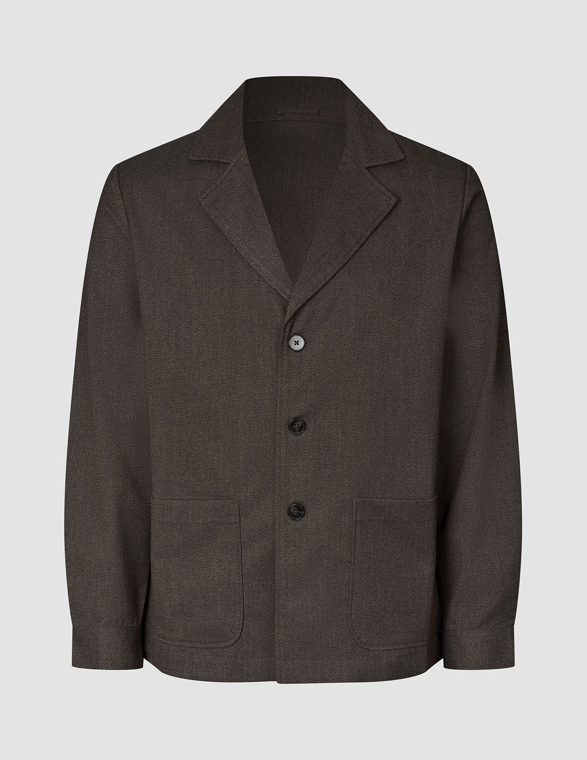 Atelier-överskjorta i mörkbrun, bruten twill med skårad krage, tre knappar och två påsydda fickor framtill.
