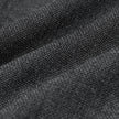 Närbild på den grå, finvävda strukturen på Motion Suit Pants Slim Pepper Grey.