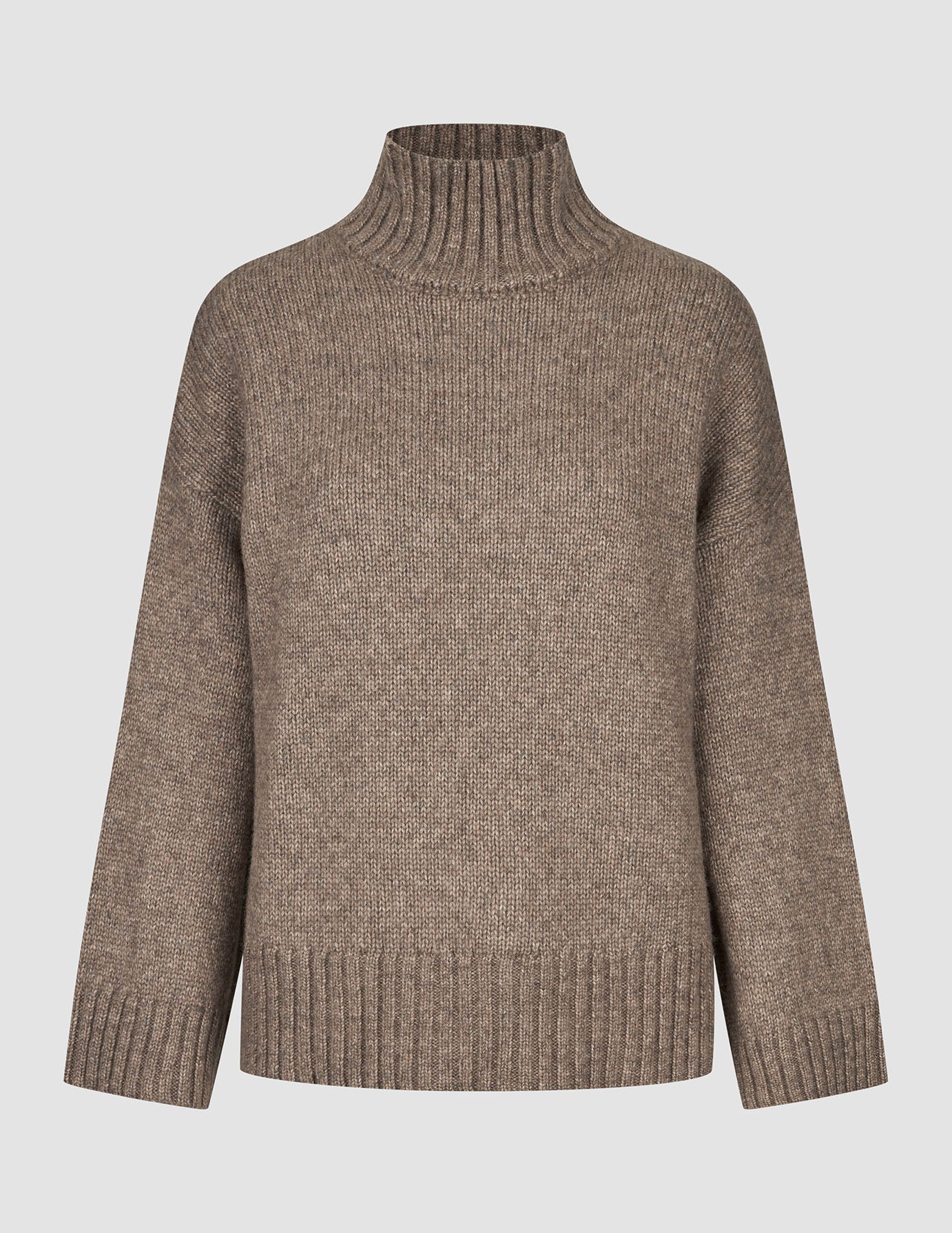 Damtröja i tjock, mjuk ull med hög hals, i färgen taupe melange, med ribbad krage och nederkant.
